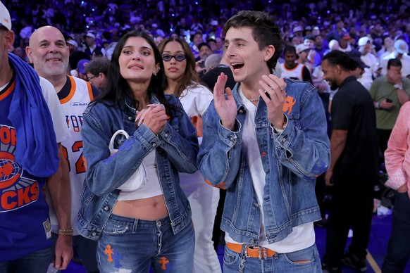 Jun 10, 2026; New York, New York, USA; Kylie Jenner and Timothee Chalamet react after the New York Knicks defeated the San Antonio Spurs in game four of the 2026 NBA Finals at Madison Square Garden. M ...