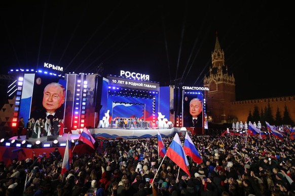 MOSCOW, RUSSIA - MARCH 18: (RUSSIA OUT) Russian President Vladimir Putin speeches during the concert at Red Square, mariking 10th anneversary of Russian annexation of Crimea, on March 18, 2024 in Mosc ...