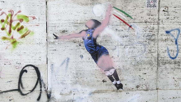 A view of a mural in homage to the Italian volleyball player Paola Egonu after being vandalized, on a wall, in front of the CONI headquarters in Viale Tiziano in Rome, Tuesday, Aug. 13 2024. (Mauro Sc ...