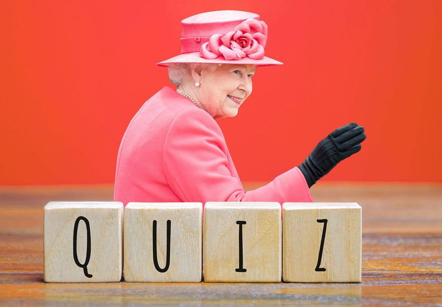 Wooden blocks with the word Quiz. Business or education concept. Answers to oral or written questions from various fields of knowledge.