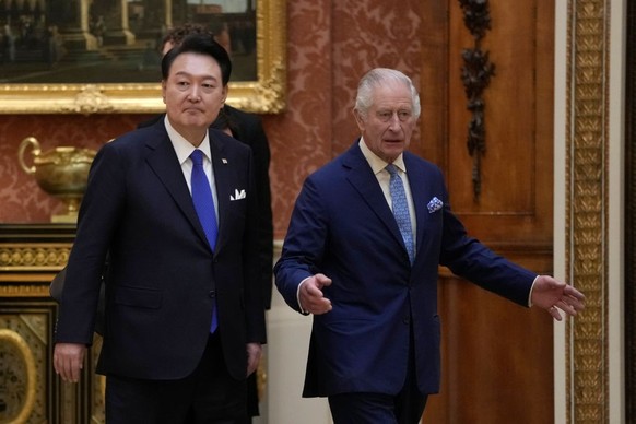 LONDON, ENGLAND - NOVEMBER 21: King Charles III with Queen Camilla shows The President of Korea Yoon Suk Yeol and First Lady, Kim Keon Hee a display of Korean items from the Royal Collection, inside B ...