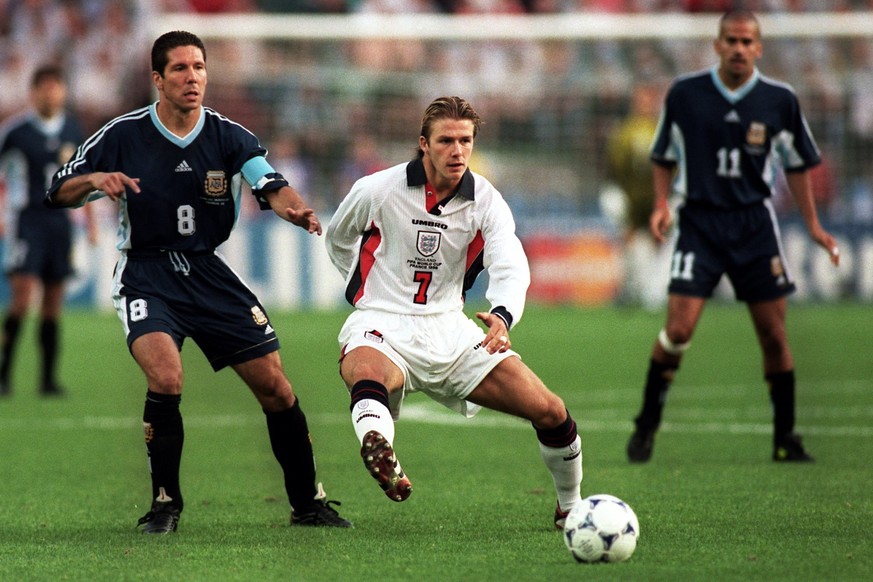 England's David Beckham (right) battles with Argentina's Diego Simeone (left) for the ball (Photo by Tony Marshall/EMPICS via Getty Images)