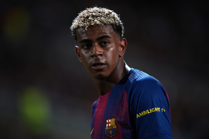 Barcelona&#039;s Lamine Yamal during the Champions League opening phase soccer match between Barcelona and Paris Saint-Germain at the Lluis Companys Olympic Stadium in Barcelona, Spain, Wednesday, Oct ...