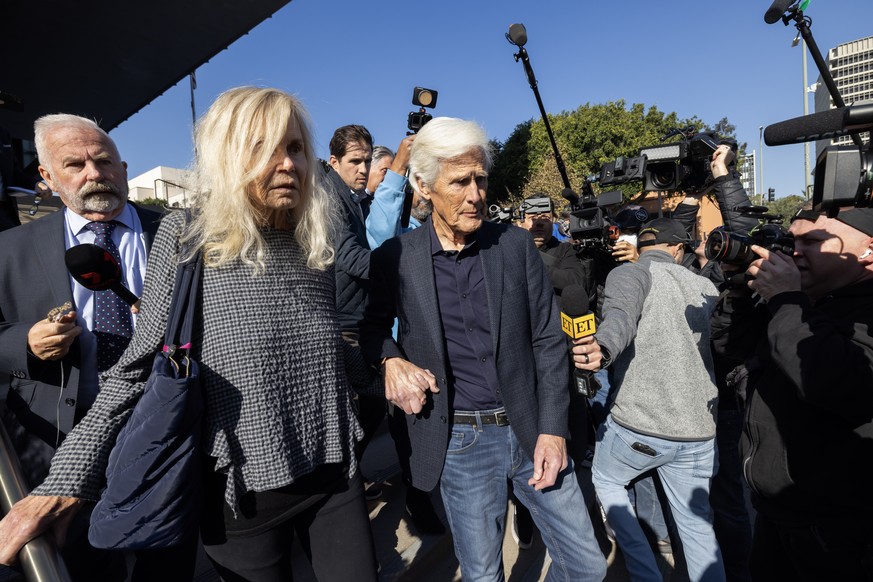 epa12568030 Suzanne Perry (L) and Keith Morrison (R), Matthew Perry&#039;s mother and stepfather, leave the courthouse after attending the sentencing hearing of Dr. Salvador Plasencia, a doctor who pl ...