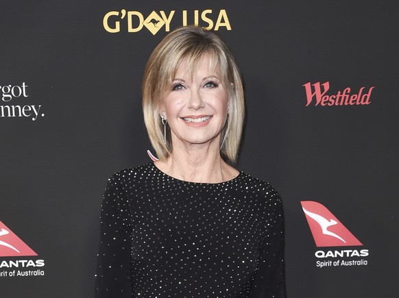 FILE - Actress and singer Olivia Newton-John attends the 2018 G&#039;Day USA Los Angeles Gala in Los Angeles on Jan. 27, 2018. Newton-John, a longtime resident of Australia whose sales topped 100 mill ...