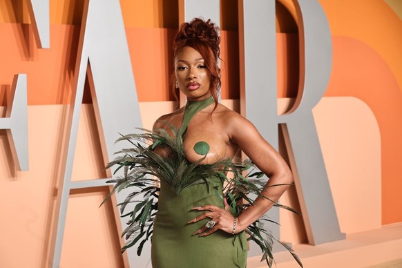 BEVERLY HILLS, CALIFORNIA - MARCH 02: (EDITORS NOTE: Image contains partial nudity.) Megan Thee Stallion attends the 2025 Vanity Fair Oscar Party Hosted By Radhika Jones at Wallis Annenberg Center for ...