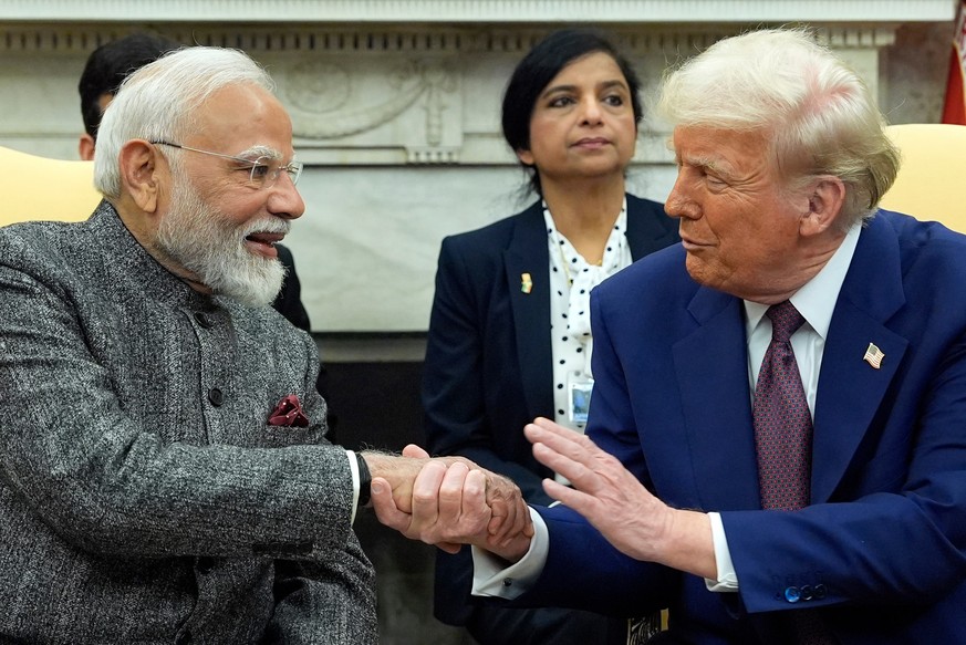 FILE -President Donald Trump shakes hands with India&#039;s Prime Minister Narendra Modi in the Oval Office of the White House, Feb. 13, 2025, in Washington. (Photo/Alex Brandon, File)
Donald Trump,Na ...