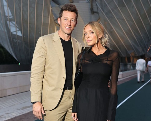 PARIS, FRANCE - JULY 25: Matt Kaplan and Alex Cooper arrive 'Prelude To The Olympics' at Fondation Louis Vuitton on July 25, 2024 in Paris, France. (Photo by Arnold Jerocki/Getty Images for  ...