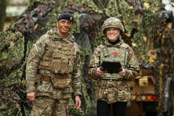 DEREHAM, ENGLAND - NOVEMBER 8: Catherine, Princess of Wales flies a drone as she visits The Queen's Dragoon Guards Regiment for the first time as their Colonel in Chief on November 8, 2023 in Der ...