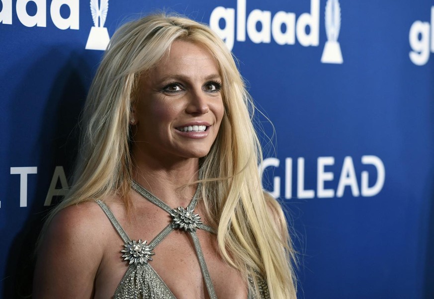 FILE - This April 12, 2018, file photo shows Britney Spears at the 29th annual GLAAD Media Awards in Beverly Hills, Calif. A Los Angeles judge is set to consider whether to extend a temporary restrain ...