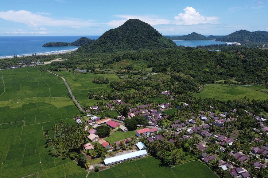 epa12053247 An aerial view of rural patchouli farming areas at Umong Seuribee village, Lhoong, Aceh Jaya District, Aceh, Indonesia, 08 April 2025 (issued 25 April 2025). Patchouli, locally known as ni ...
