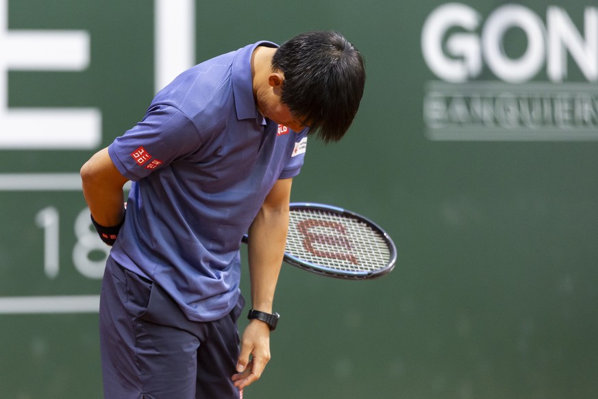 epa12120622 Kei Nishikori of Japan in action against Karen Khachanov of Russia during their round of 16 match at the Geneva Open tennis tournament, in Geneva, Switzerland, 20 May 2025. EPA/CYRIL ZINGA ...