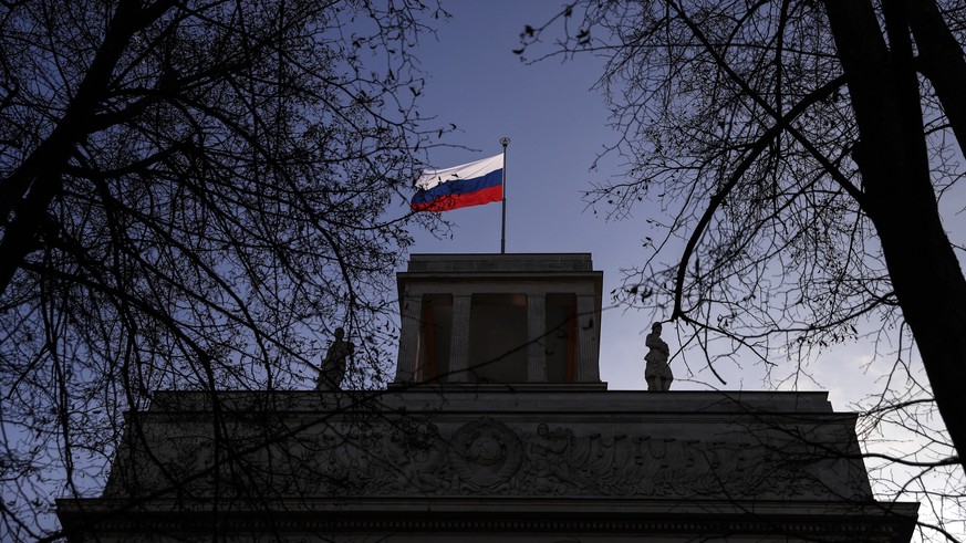 epa08493630 (FILE) - A Russian flag waves on top of the Russian Embassy in Berlin, Germany, 04 December 2019 (reissued 18 June 2020). In the murder case of an exiled Chechen in Berlin in Augusgt 2019, ...