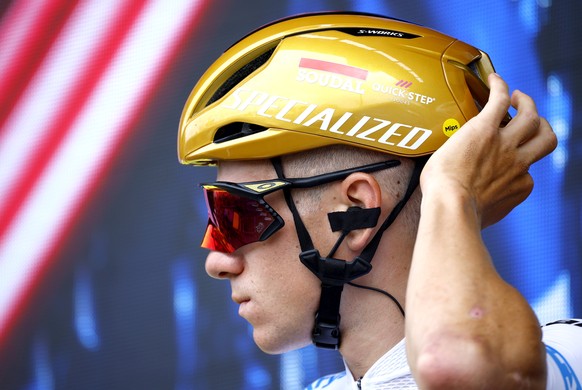 epa12246933 White Jersey best young rider Belgian rider Remco Evenepoel of Soudal Quick-Step team.signs autographs before the 14th stage of the Tour de France cycling race over 182.6km from Pau to Luc ...
