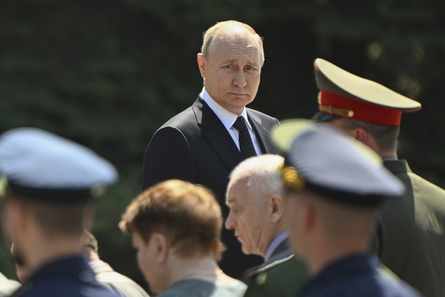 Russian President Vladimir Putin attends a wreath-laying ceremony marking the 82nd anniversary of the Nazi German invasion into Soviet Union in World War II on the Remembrance and Sorrow Day at the To ...