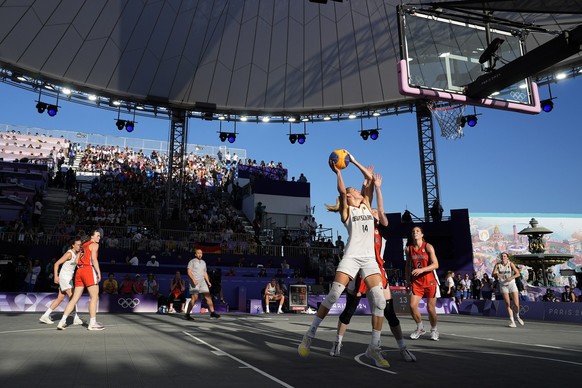 Germany&#039;s Sonja Greinacher (14) shoots against Canada during a women&#039;s 3x3 basketball semifinal game at the 2024 Summer Olympics, Monday, Aug. 5, 2024, in Paris, France. (AP Photo/Frank Fran ...