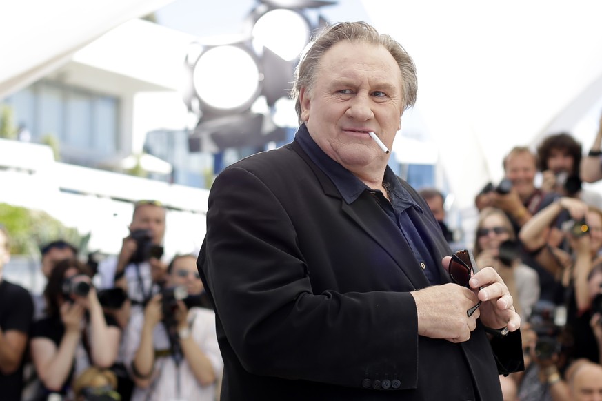 FILE - Actor Gerard Depardieu poses for photographers during a photo call for the film Valley of Love, at the 68th international film festival, Cannes, southern France, Friday, May 22, 2015. More than ...