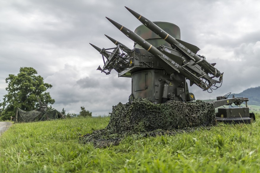The rapier with the four surface-to-air missiles stands on a hill, and nearby, there is also its radar and the missile control, pictured on site of the anti-aircraft division of the Swiss Armed Forces ...