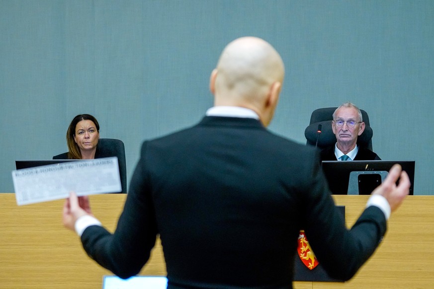 epaselect epa09693057 (L-R) Co-judge Henriette Thoner, convicted terrorist Anders Behring Breivik, and judge Dag Bjorvik during the first day of Breivik&#039;s parole hearing, in Skien, Norway, 18 Jan ...