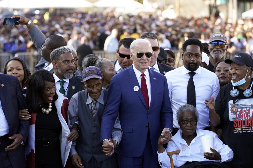 President Joe Biden prepares to walk across the Edmund Pettus Bridge in Selma, Ala., Sunday, March 5, 2023, to commemorate the 58th anniversary of &quot;Bloody Sunday,&quot; a landmark event of the ci ...