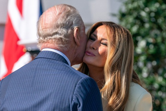 epa12918097 Britain's King Charles III greets US First Lady Melania Trump (R) at the White House in Washington, DC, USA, 27 April 2026. King Charles III and Queen Camilla are on a four-day state  ...