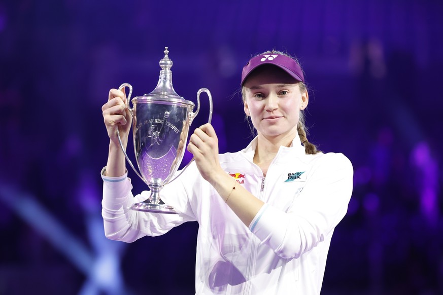 epa12512632 Elena Rybakina of Kazakhstan poses with her trophy after winning the 2025 WTA Finals final match against Aryna Sabalenka of Belarus in Riyadh, Saudi Arabia, 08 November 2025. EPA/STRINGER