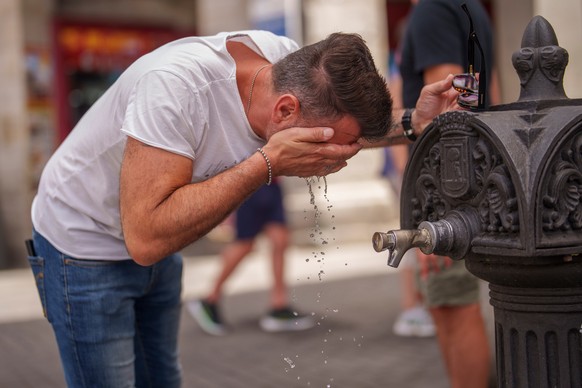 FILE - A man cools off in a fountain during a hot and sunny day of summer in Madrid, Spain, July 19, 2023. (AP Photo/Manu Fernandez, File)
Europe Heat Deaths