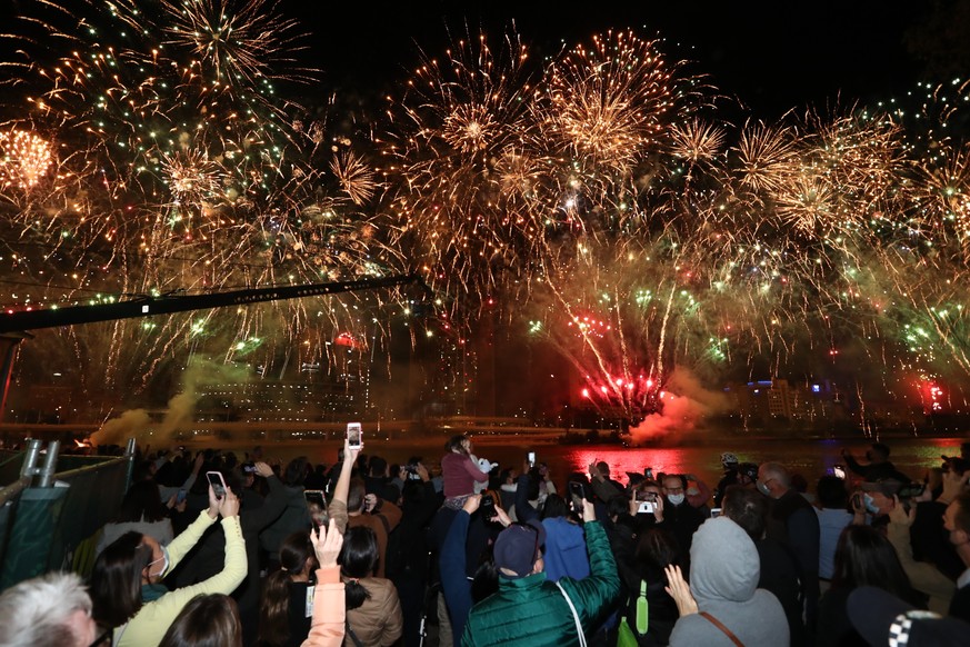 People celebrate in Brisbane, Australia, Wednesday, July 21 , 2021, following an announcement by the International Olympic Committee that Brisbane was picked to host the 2032 Olympics The Australian c ...