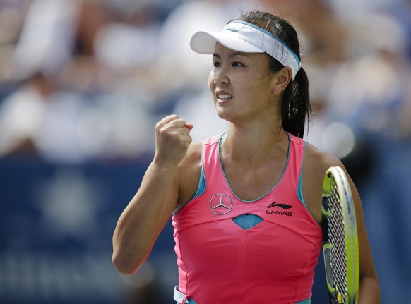 Peng Shuai, of China, reacts after a shot against Caroline Wozniacki, of Denmark, during the semifinals of the 2014 U.S. Open tennis tournament, Friday, Sept. 5, 2014, in New York. (AP Photo/Darron Cu ...