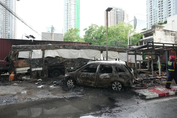 Damaged vehicles are seen at a train crash site near Makkasan station in Bangkok, Thailand, Saturday, May 16, 2026. (AP Photo/Sakchai Lalit)
Thailand Train Crash
