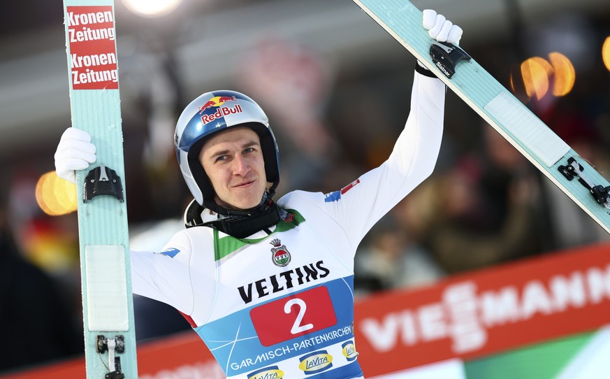 epa11801559 Daniel Tschofenig of Austria reacts during the Round 2 in the second stage of the 73rd Four Hills Ski Jumping Tournament in Garmisch-Partenkirchen, Germany, 01 January 2025. EPA/ANNA SZILA ...