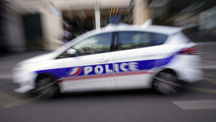 A French Police car patrols in Paris, France, Thursday, Sept. 8, 2022. A French police officer is in custody after shooting to death a driver who failed to obey an order to stopin the southern French  ...