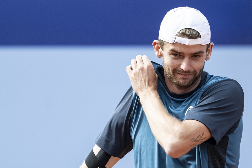 Jerome Kym of Switzerland reacts to Arthur Cazaux of France during their quarter final game at the Swiss Open tennis tournament in Gstaad, Switzerland, on Friday, July 18, 2025. (KEYSTONE/Peter Schnei ...
