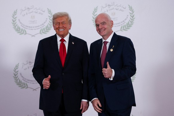 President Donald Trump and FIFA president Gianni Infantino pose for a photo in Sharm el-Sheikh, Egypt, Monday, Oct. 13, 2025. (Suzanne Plunkett, Pool Photo via AP)
Egypt Mideast Wars