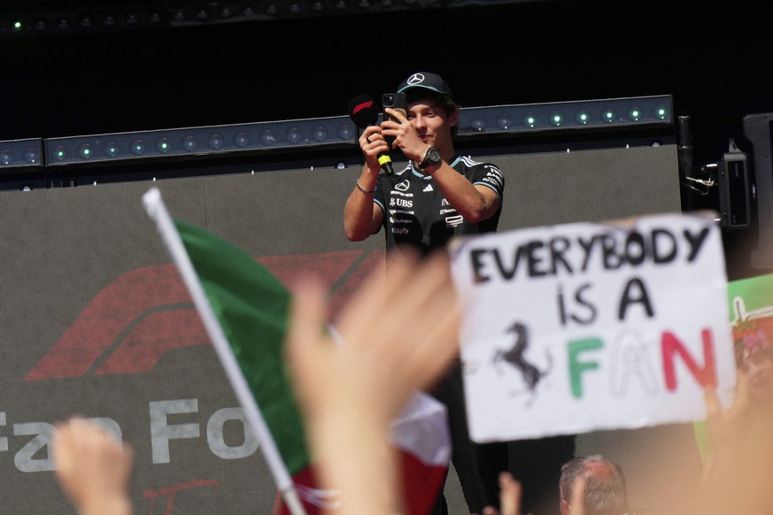 Mercedes driver Andrea Kimi Antonelli of Italy takes photos at the fan zone prior to the start of the third free practice at the Enzo and Dino Ferrari racetrack, ahead the Italy&#039;s Emilia Romagna  ...
