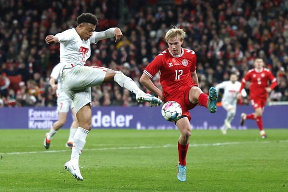 Switzerland&#039;s Dan Ndoye, left, and Denmark&#039;s Victor Kristiansen in action during the friendly soccer match between Denmark and Switzerland at the Parken stadium in Copenhagen, Denmark, Satur ...