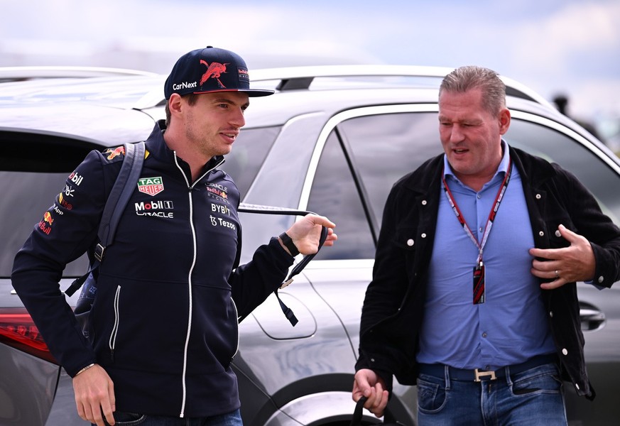 epa10045847 Dutch Formula One driver Max Verstappen (L) of Red Bull Racing arrives with his father Jos Verstappen (R) ahead of the practice session of the Formula One Grand Prix of Britain at the Silv ...