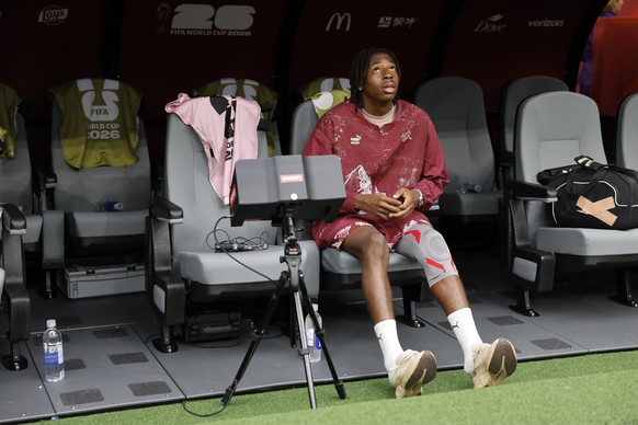 KEYPIX - Switzerland's Johan Manzambi, who suffered an injury in a training sits on the bench prior the World Cup round of 16 soccer match between Switzerland and Colombia at the BC Place stadium ...