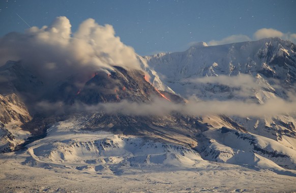 FILE - Lava and steam are visible during the the Shiveluch volcano&#039;s eruption on the Kamchatka Peninsula in Russia, Sunday, Nov. 6, 2022. Shiveluch erupted on Russia&#039;s fareastern Kamchatka P ...