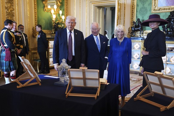President Donald Trump, first lady Melania Trump, Britain&#039;s King Charles III and Britain&#039;s Queen Camilla view a special display of items from the Royal Collection relating to the United Stat ...