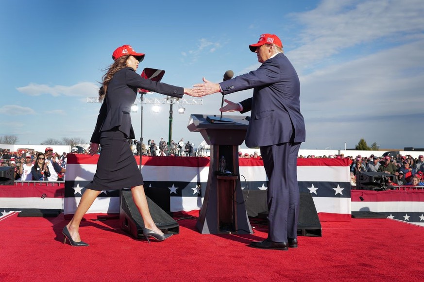 VANDALIA, OHIO - MARCH 16: Republican presidential candidate former President Donald Trump greets South Dakota Gov. Kristi Noem during a rally at the Dayton International Airport on March 16, 2024 in  ...