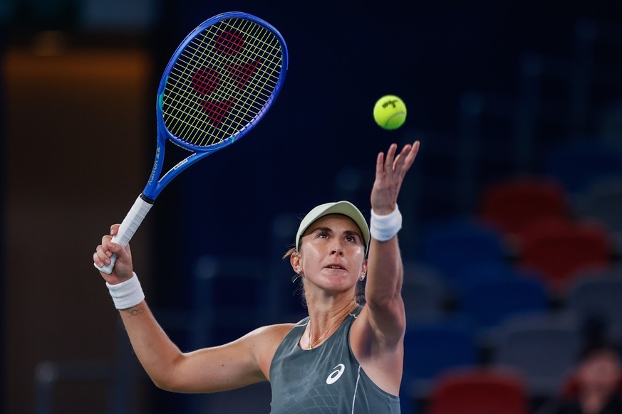 WUHAN, CHINA - OCTOBER 9: Belinda Bencic of Switzerland serves against Iga Świątek of Poland in the Women&#039;s Singles Round of 16 match during day six of the 2025 Wuhan Open at Optics Valley Intern ...
