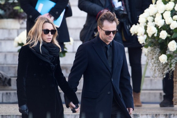 PARIS, FRANCE - DECEMBER 09: Laura Smet and David Hallyday during Johnny Hallyday&#039;s funeral at Eglise De La Madeleine on December 9, 2017 in Paris, France. France pays tribute to Johnny Hallyday, ...