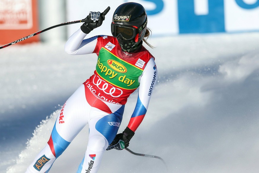 Alpine Skiing: FIS World Cup-Women s Super G Dec 8, 2013 Lake Louise, Alberta, Canada First place finisher Lara Gut of Switzerland reacts as she finishes a run during the women s super G at the FIS al ...