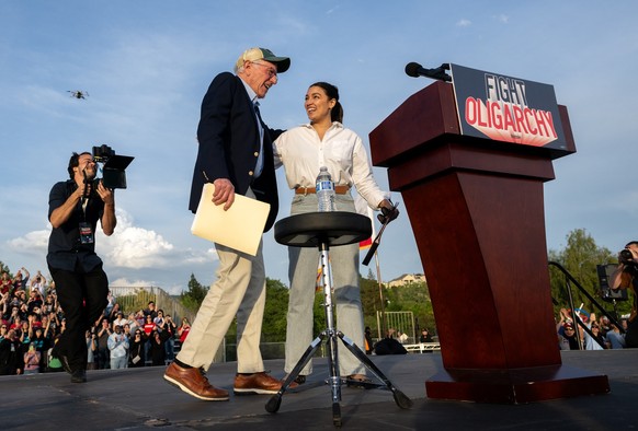 April 15, 2025, Folsom, Ca, USA: Congresswoman Alexandria Ocasio-Cortez introduces Bernie Sanders during the Fighting Oligarchy From Here with Bernie Sanders and AOC rally at Folsom Lake College on Tu ...