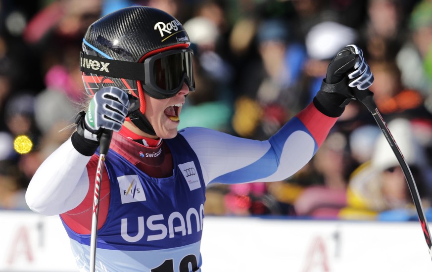 Switzerland&amp;#039;s Lara Gut raises her arms and celebrates at the finish line following her run in the women&amp;#039;s World Cup super-G skiing event, in Beaver Creek, Colo., Saturday, Nov. 30, 2 ...
