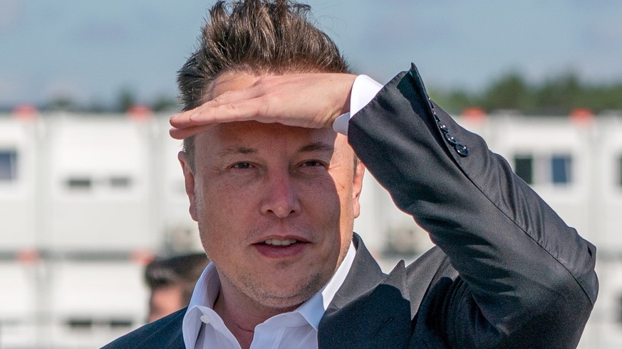 epa09889605 (FILE) - Tesla and SpaceX CEO Elon Musk arrives for a statement at the construction site of the Tesla Giga Factory in Gruenheide near Berlin, Germany, 03 September 2020 (reissued 14 April  ...