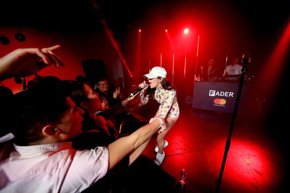 LOS ANGELES, CA - FEBRUARY 11: Singer/songwriter Charli XCX performs onstage with musical artist SOPHIE and singer A. G. Cook at a must-see line-up presented by The FADER and Mastercard at the Masterp ...