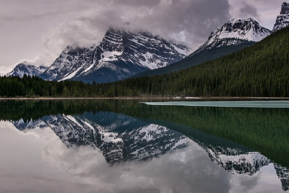 JASPER, CANADA - APRIL 25: A late spring storm rolls into the Rockies along the Icefields Parkway between Lake Louise and Jasper on April 25, 2016 near Jasper, Alberta, Canada. Jasper is the largest N ...