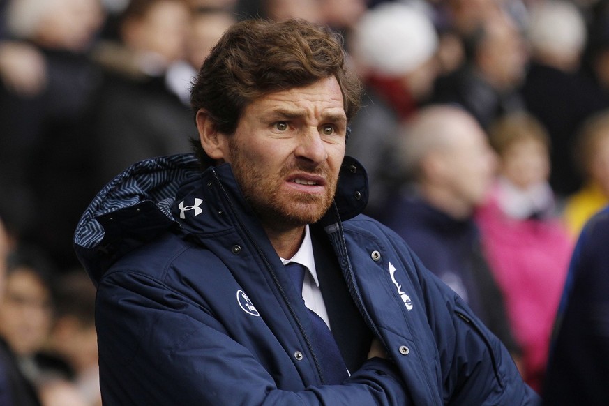 Tottenham Hotspur&#039;s manager Andre Villas-Boas looks on from the dugout before the start of their English Premier League soccer match against Manchester United at White Hart Lane, London, Sunday,  ...